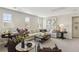 Relaxing living room with neutral colors, decorative accents, and cozy seating at 10196 Sequoia Glen Ave, Las Vegas, NV 89166