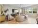Bright living room features neutral decor, plush seating, and plenty of natural light, creating a cozy atmosphere at 10196 Sequoia Glen Ave, Las Vegas, NV 89166