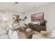 Cozy living area showcasing tasteful decor, plush seating, and bright natural light, creating a welcoming atmosphere at 10196 Sequoia Glen Ave, Las Vegas, NV 89166