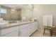 Primary bathroom with double vanity sinks, drawers and cabinet storage at 10196 Sequoia Glen Ave, Las Vegas, NV 89166