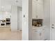 Hallway leads to a custom pantry with ample storage and built-in cabinets at 10196 Sequoia Glen Ave, Las Vegas, NV 89166