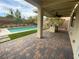 Spacious backyard showcasing a covered patio with built-in grill area, perfect for enjoying outdoor living and entertaining at 10331 Northern Hills Ave, Las Vegas, NV 89166