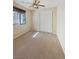Bedroom featuring neutral carpeting, a window with blinds, and a ceiling fan at 10331 Northern Hills Ave, Las Vegas, NV 89166