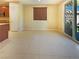 Bright dining area features tile flooring, neutral paint, and a sliding glass door at 10331 Northern Hills Ave, Las Vegas, NV 89166
