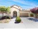 Charming single-Gathering home featuring a two-car garage and well-maintained front yard landscaping at 10331 Northern Hills Ave, Las Vegas, NV 89166