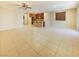 Spacious living room with tiled floors leading into the kitchen, ideal for gatherings at 10331 Northern Hills Ave, Las Vegas, NV 89166