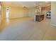 Open concept living space with tile flooring, neutral paint, and kitchen island at 10331 Northern Hills Ave, Las Vegas, NV 89166