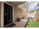 Cozy patio with a seating area, artificial turf, and shade covering, ideal for relaxation and outdoor living at 10400 Beautiful Fruit St, Las Vegas, NV 89183