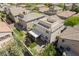 A bird's eye view captures the home, with backyard, rooftop terrace, and surrounding neighborhood at 10565 Olinda St, Las Vegas, NV 89179