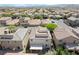 An aerial view shows a house with a roof deck, backyard, and convenient location in a desirable neighborhood at 10565 Olinda St, Las Vegas, NV 89179