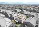 A bird's-eye view capturing the home's outdoor space, including a roof deck, patio, and manicured lawn at 10565 Olinda St, Las Vegas, NV 89179