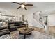 Spacious living room features wood floors, recessed lighting, stairs, and a ceiling fan at 10565 Olinda St, Las Vegas, NV 89179