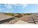 Breathtaking rooftop view overlooking a charming neighborhood with diverse architecture and lush greenery under a blue sky at 10565 Olinda St, Las Vegas, NV 89179