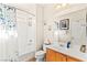 Functional bathroom featuring a shower and tub combination with a single sink vanity at 10823 Drake Ridge Ave, Las Vegas, NV 89166