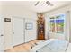 Cozy bedroom with a view to the pool, closet and built in bookshelf at 10823 Drake Ridge Ave, Las Vegas, NV 89166