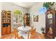 Cozy dining area with natural light, featuring a window overlooking the yard at 10823 Drake Ridge Ave, Las Vegas, NV 89166