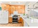 Modern kitchen with stainless steel appliances, quartz countertops, and plenty of cabinet space at 10823 Drake Ridge Ave, Las Vegas, NV 89166