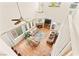 Bright living room with large windows, fireplace, and vaulted ceiling at 10823 Drake Ridge Ave, Las Vegas, NV 89166