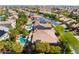 Aerial view of neighborhood with homes featuring pools and mature landscaping at 11237 Campsie Fells Ct, Las Vegas, NV 89141