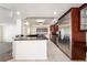 Spacious kitchen with stainless steel appliances and dark wood cabinetry at 11237 Campsie Fells Ct, Las Vegas, NV 89141
