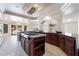 Open kitchen features a large island, and view of the backyard pool at 11237 Campsie Fells Ct, Las Vegas, NV 89141
