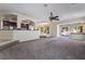 Open-concept living area connects kitchen and the backyard through sliding doors at 11237 Campsie Fells Ct, Las Vegas, NV 89141