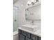 Stylish bathroom featuring a modern vanity with a sleek vessel sink, complemented by a bright glass shower at 11578 Suburban Rd, Las Vegas, NV 89135