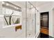 Modern bathroom features a glass shower and access to a walk-in closet at 11578 Suburban Rd, Las Vegas, NV 89135
