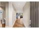 Elegant entryway with hardwood floors, leading to an open-concept living space at 11578 Suburban Rd, Las Vegas, NV 89135