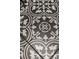 Close-up of elegant black and white patterned tile flooring at 11578 Suburban Rd, Las Vegas, NV 89135