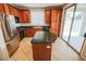 Kitchen with granite countertops, stainless steel appliances, and access to the backyard at 11900 Calle De Sol Dr, Las Vegas, NV 89138