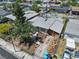 Aerial view of residential home with skateboard pool and xeriscaped front yard at 121 N 20Th St, Las Vegas, NV 89101