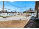 Wide shot of the home's backyard skate pool surrounded by a painted privacy fence at 121 N 20Th St, Las Vegas, NV 89101