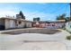 Backyard featuring a skate pool, surrounded by a privacy fence covered with graffiti at 121 N 20Th St, Las Vegas, NV 89101