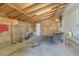 An unfinished garage space with exposed beams and concrete flooring at 121 N 20Th St, Las Vegas, NV 89101