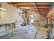 A rustic garage space featuring concrete floors, and cinder block walls at 121 N 20Th St, Las Vegas, NV 89101