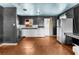 Cozy kitchen features white appliances, ample counter space, and creative window art, creating a unique culinary space at 121 N 20Th St, Las Vegas, NV 89101
