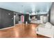 Open-concept room featuring hardwood floors and view into the kitchen, blending living and dining spaces seamlessly at 121 N 20Th St, Las Vegas, NV 89101