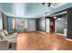 Spacious living room featuring hardwood floors and a window, with a tan sofa at 121 N 20Th St, Las Vegas, NV 89101