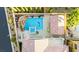 Aerial view of backyard with a pool, spa, and patio area, complete with lush landscaping, offering a perfect outdoor oasis at 12219 Crystal Shore Ave, Las Vegas, NV 89138