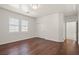 Bedroom with wood floors, double windows and neutral walls, offering ample natural light at 12219 Crystal Shore Ave, Las Vegas, NV 89138