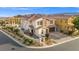 Beautiful two-story home with stone accents, a three-car garage, a manicured yard, and a welcoming entrance at 12219 Crystal Shore Ave, Las Vegas, NV 89138