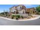 Elegant home on corner lot, featuring landscaped yard and manicured bushes at 12219 Crystal Shore Ave, Las Vegas, NV 89138