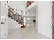 Grand foyer with staircase, high ceilings, and abundant natural light at 12219 Crystal Shore Ave, Las Vegas, NV 89138