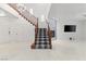 Bright foyer features a staircase and a fireplace at 12219 Crystal Shore Ave, Las Vegas, NV 89138
