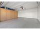 Bright and clean garage with epoxy flooring and ample storage cabinets for all your needs at 12219 Crystal Shore Ave, Las Vegas, NV 89138