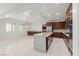 Spacious kitchen features granite counters and dark wood cabinets at 12219 Crystal Shore Ave, Las Vegas, NV 89138