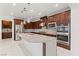 Spacious kitchen with stainless steel appliances and granite countertops at 12219 Crystal Shore Ave, Las Vegas, NV 89138