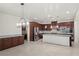 Spacious kitchen with stainless steel appliances, granite countertops, and ample cabinet space at 12219 Crystal Shore Ave, Las Vegas, NV 89138