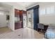 Office kitchenette features modern appliances, granite countertops, and backyard views at 12219 Crystal Shore Ave, Las Vegas, NV 89138